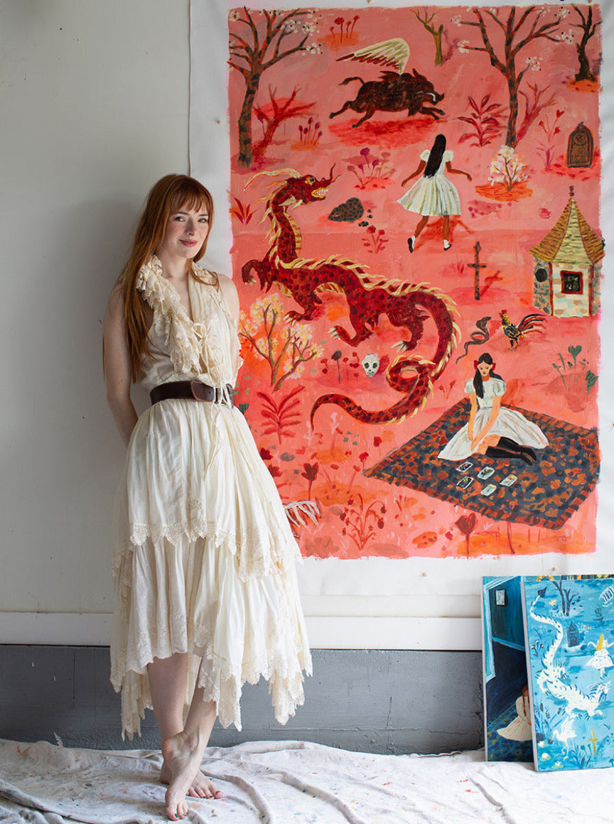 Photo of Jane in front of painting from fall 2025 collection
